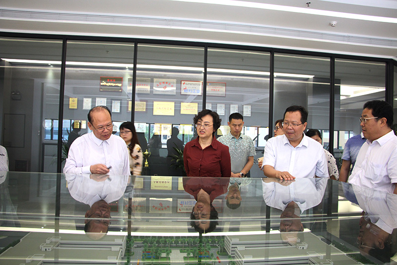 Visiting Leaders Listen to the Planning and Construction of Huinan KTC Company